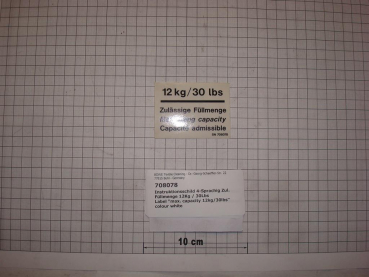 Label "max. capacity 12kg/30lbs" colour white