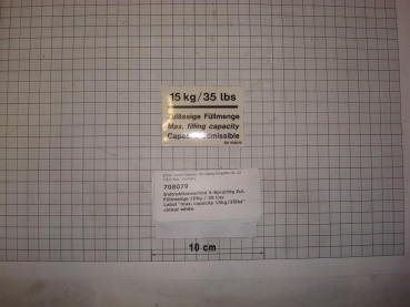 Label "max. capacity 15kg/35lbs" colour white